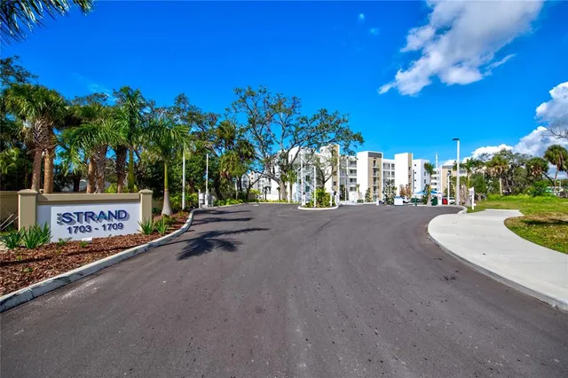 a city view with tall buildings and lake view