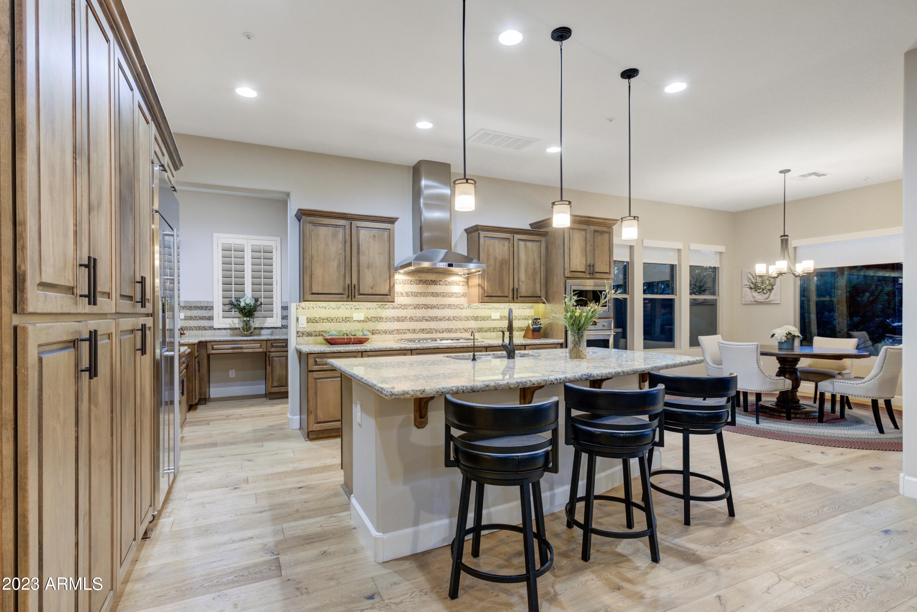 17651 Blaze Lane Rio Verde, AZ 85263 - Photo 11 of 24 012_Kitchen To Dining Room