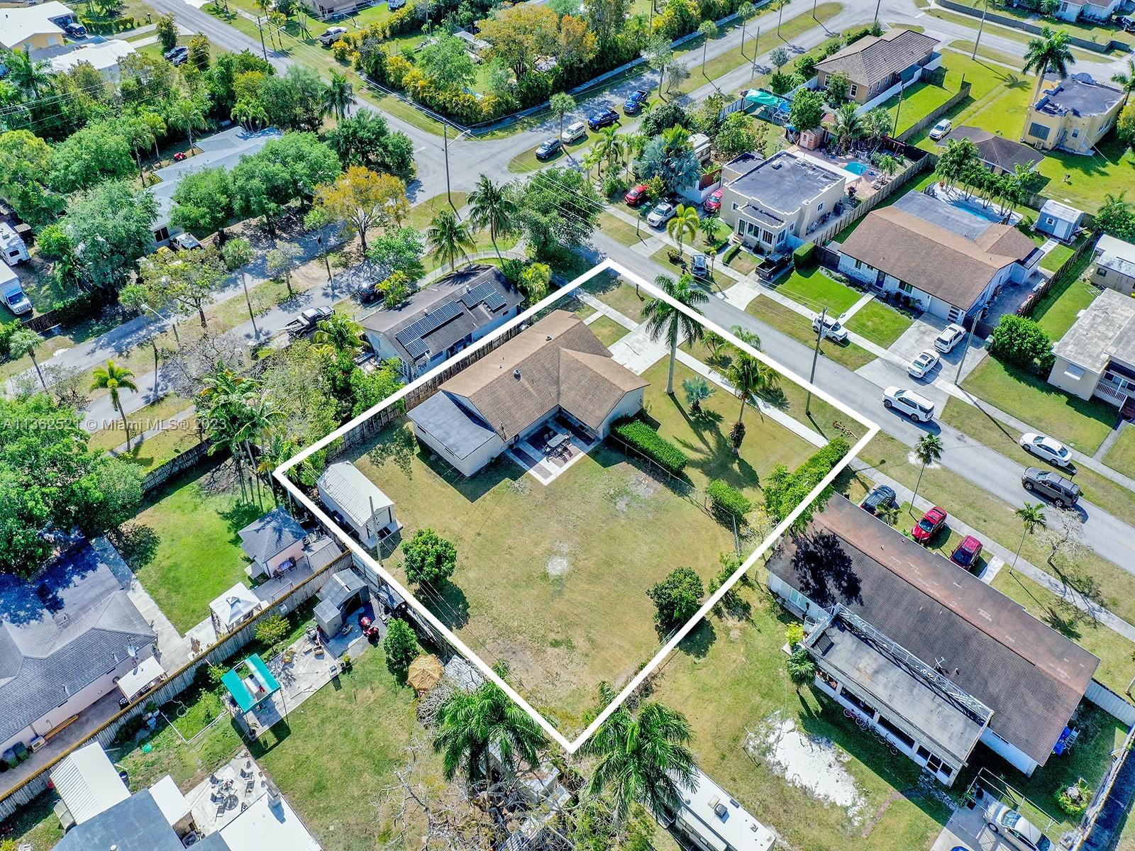 131 Northeast 17th Street Homestead, FL 33030 - Photo 22 of 24 an aerial view of a residential houses with outdoor space