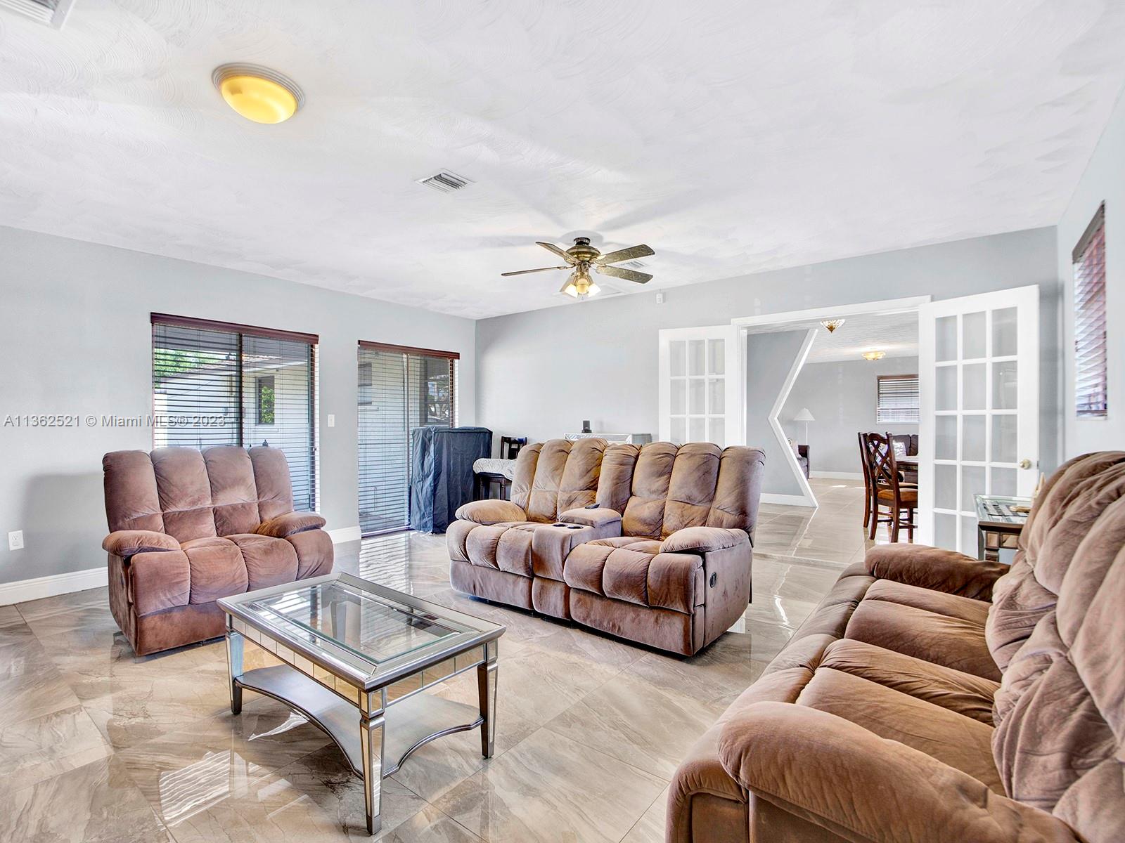 131 Northeast 17th Street Homestead, FL 33030 - Photo 10 of 24 a living room with furniture