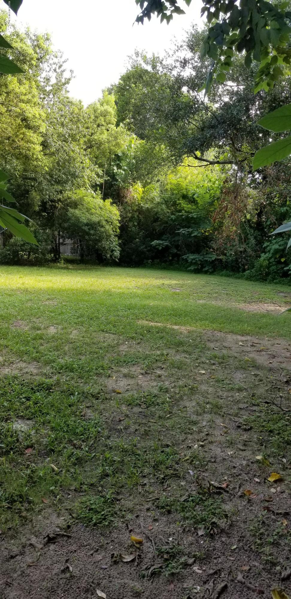 1847 Griflet Road Jacksonville, FL 32211 - Photo 15 of 32 a view of a yard with a house