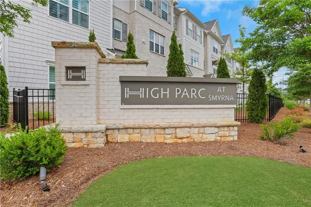 a view of a street sign of a building