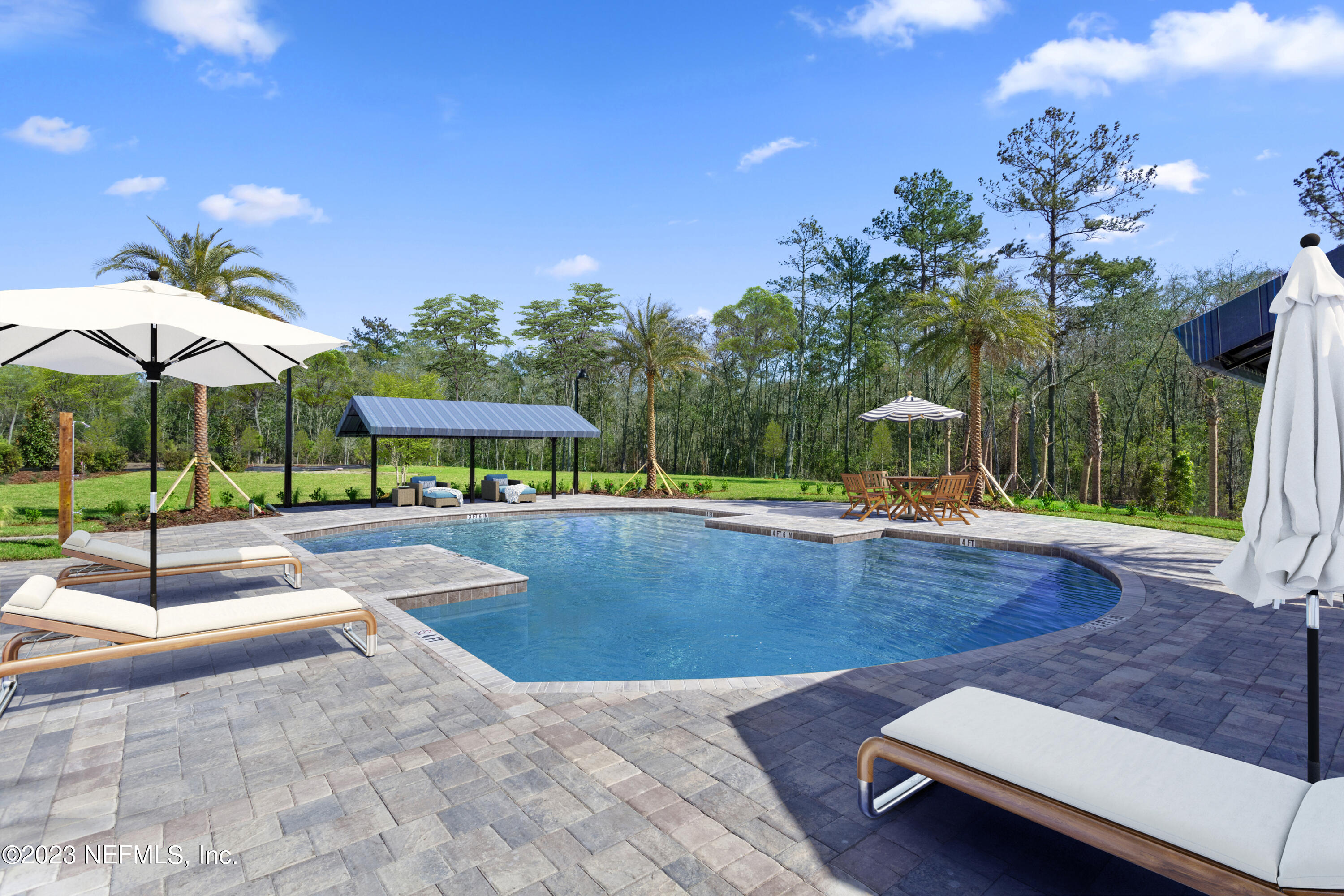 318 Rambling Brk Trail St. Johns, FL 32259 - Photo 3 of 4 a view of a swimming pool with a patio