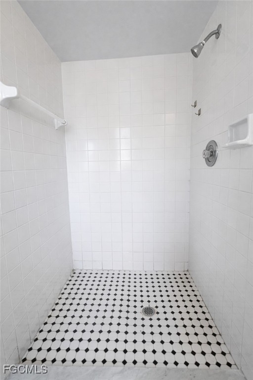 5014 26th Street Southwest Lehigh Acres, FL 33973 - Photo 14 of 20 a bathroom with a shower