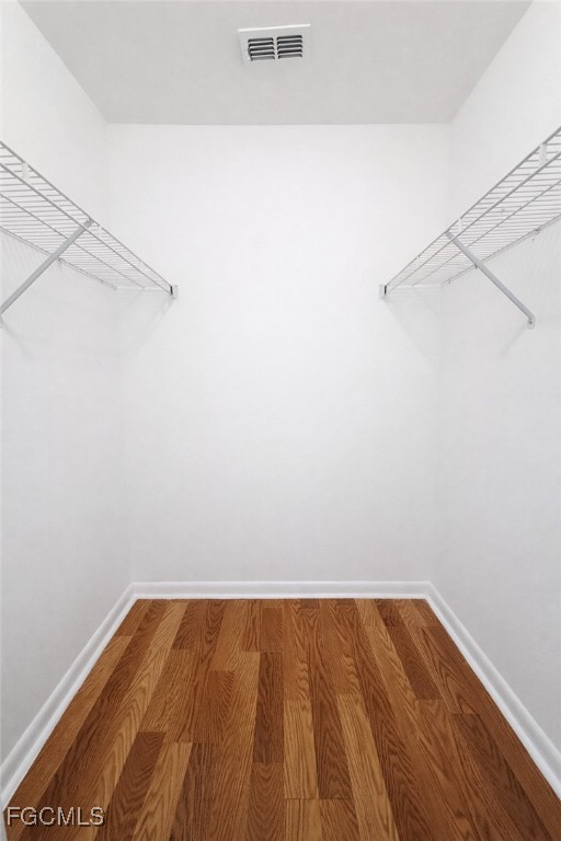 5014 26th Street Southwest Lehigh Acres, FL 33973 - Photo 18 of 20 a view of a room with wooden floor