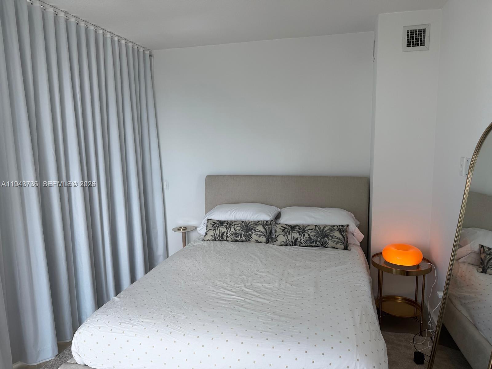 41 Southeast 5th Street, Unit 2010 Miami, FL 33131 - Photo 15 of 58 a bathroom with a toilet and a sink