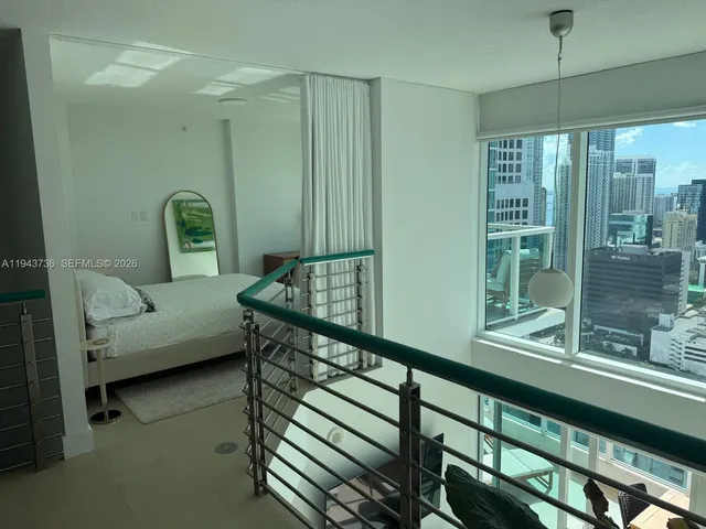 a bathroom with a shower and toilet