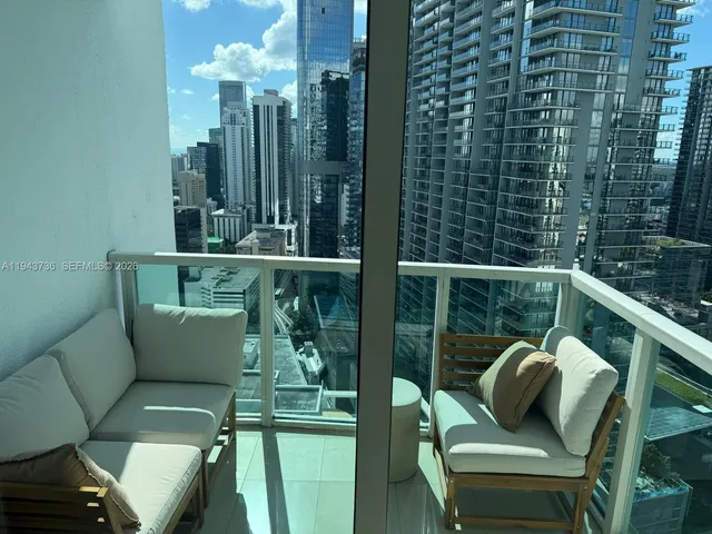 a bathroom with a sink toilet and mirror