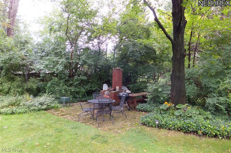 4553 Telhurst Road Cleveland, OH 44121 - Photo 20 of 20 The patio at the end of the backyard is a great place to gather and enjoy the scenery!