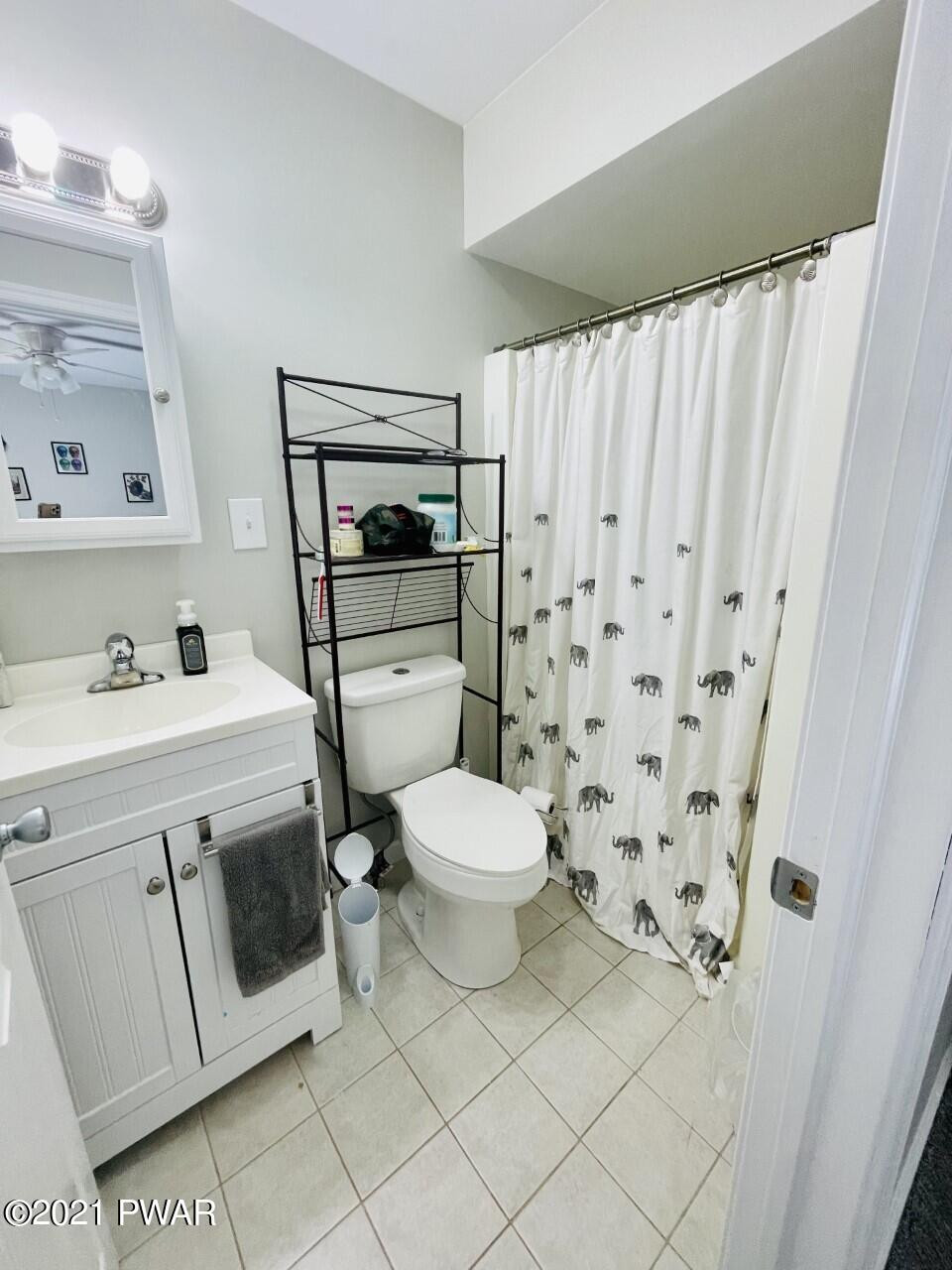 149 Walker Lake Road Shohola, PA 18458 - Photo 13 of 51 a bathroom with a sink toilet and shower