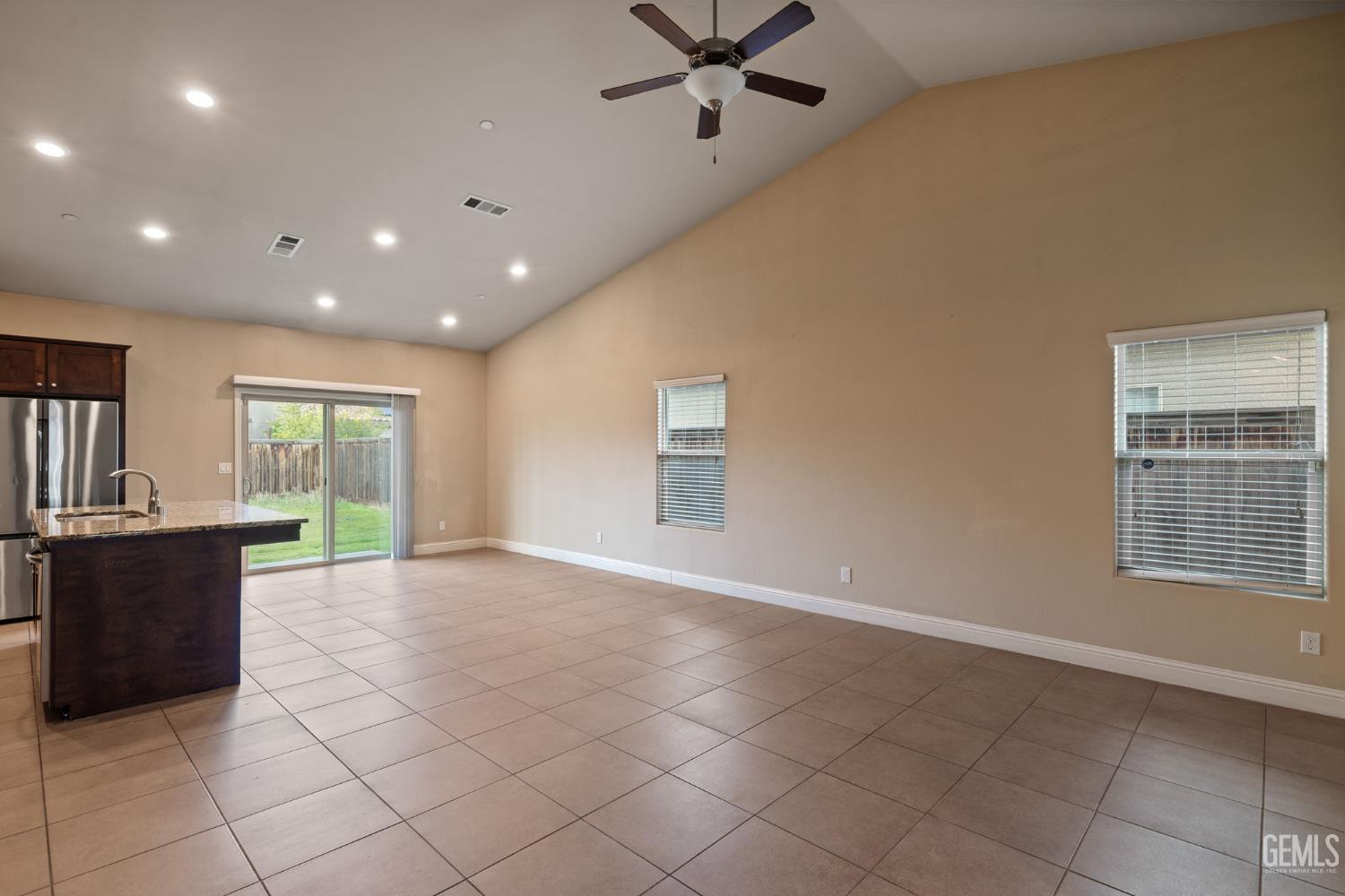 Undisclosed Address Shafter, CA 93263 - Photo 14 of 50 a view of an empty room with a window