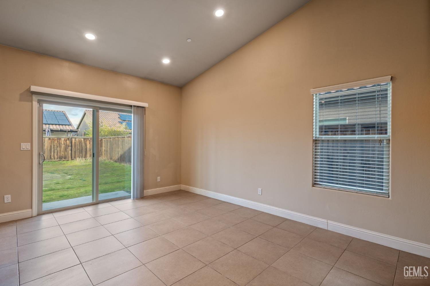 Undisclosed Address Shafter, CA 93263 - Photo 19 of 50 a view of an empty room with a window