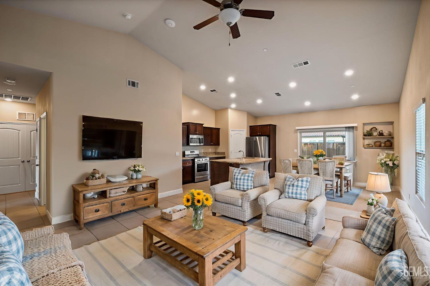 Undisclosed Address Shafter, CA 93263 - Photo 2 of 50 a living room with furniture and a flat screen tv