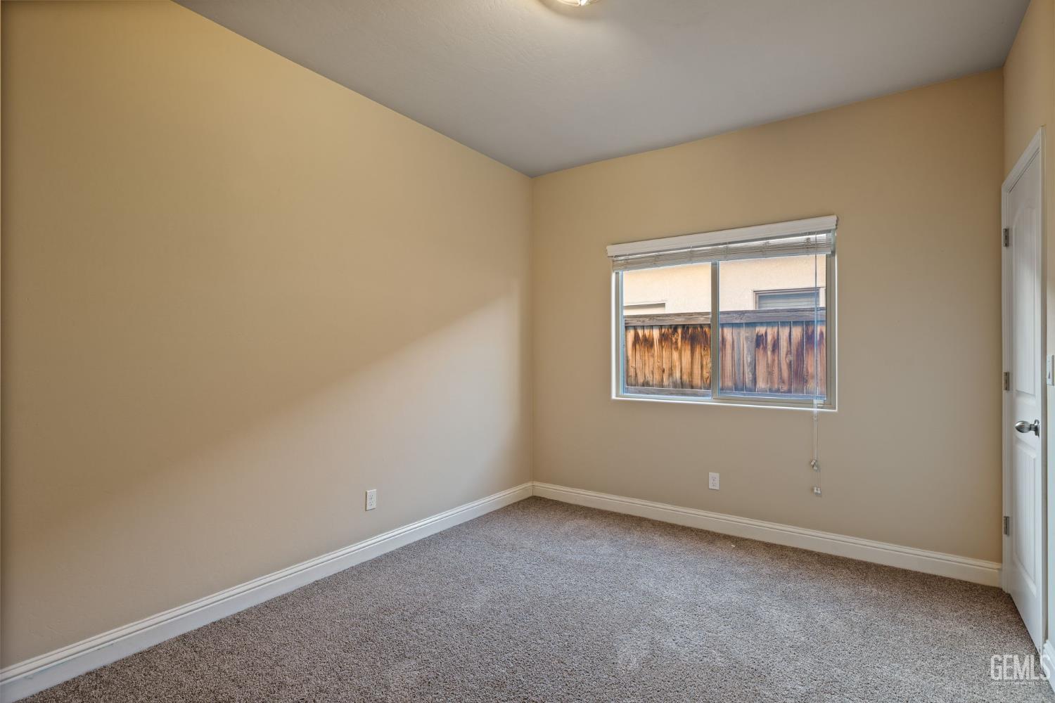 Undisclosed Address Shafter, CA 93263 - Photo 38 of 50 an empty room with a window