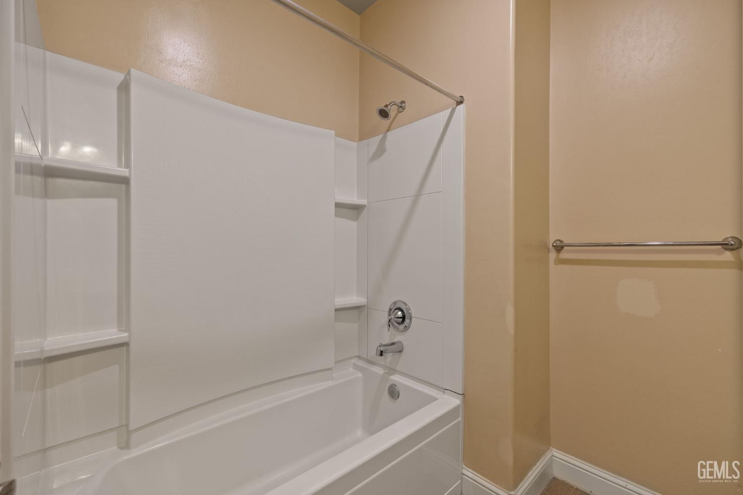 Undisclosed Address Shafter, CA 93263 - Photo 42 of 50 a white bath tub sitting next to a shower