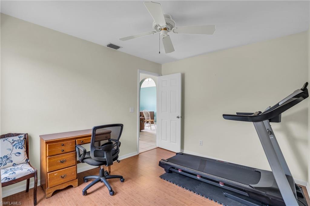 18447 Fuchsia Road Fort Myers, FL 33967 - Photo 18 of 43 a view of a workspace with furniture and a window