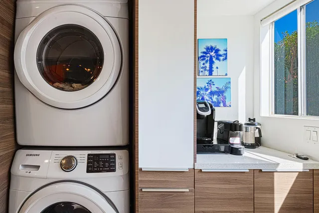 a view of livingroom with washer and dryer