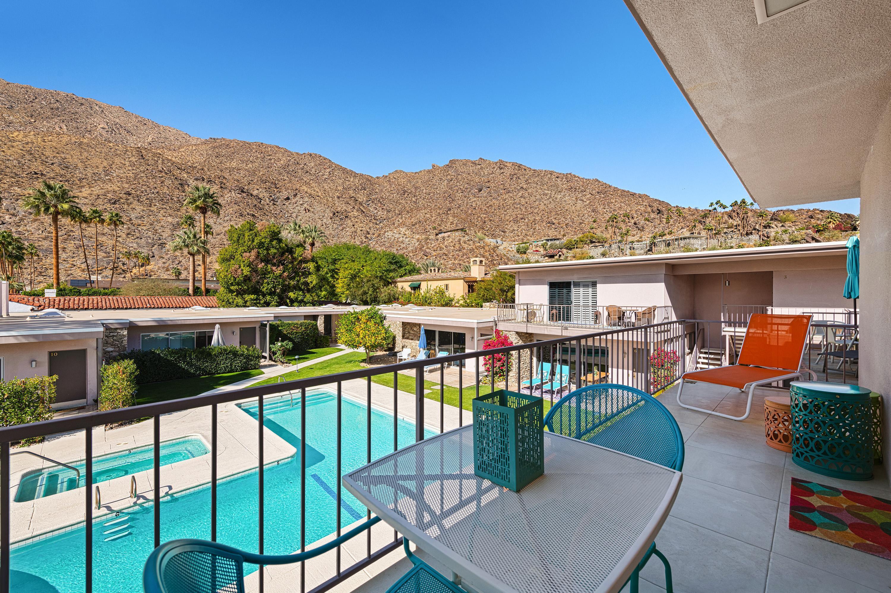 500 West Arenas Road, Unit 2 Palm Springs, CA 92262 - Photo 28 of 36 a view of a balcony with chairs