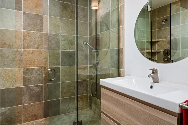 a house with swimming pool in front of it