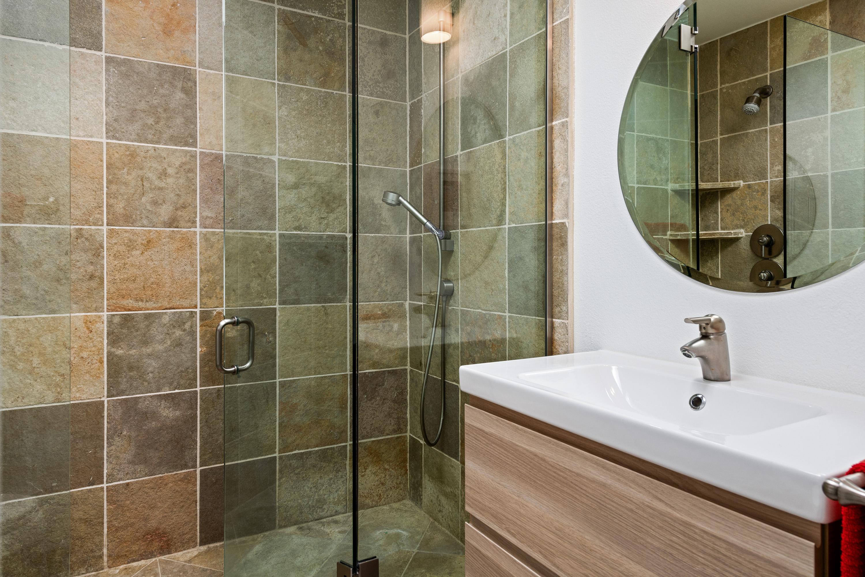 500 West Arenas Road, Unit 2 Palm Springs, CA 92262 - Photo 30 of 36 a bathroom with a sink and mirror