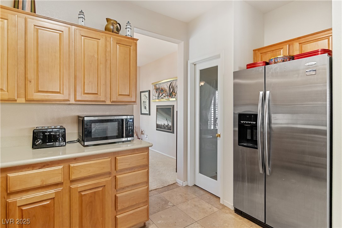 2078 Willow Bay Road Laughlin, NV 89029 - Photo 17 of 99 Kitchen featuring stainless steel appliances and light countertops