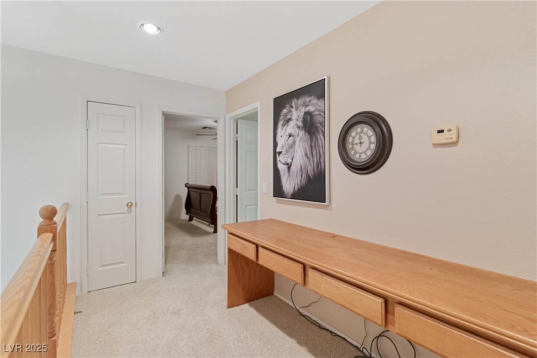 2078 Willow Bay Road Laughlin, NV 89029 - Photo 44 of 99 Upstairs corridor with light colored carpet, recessed lighting, and a desk