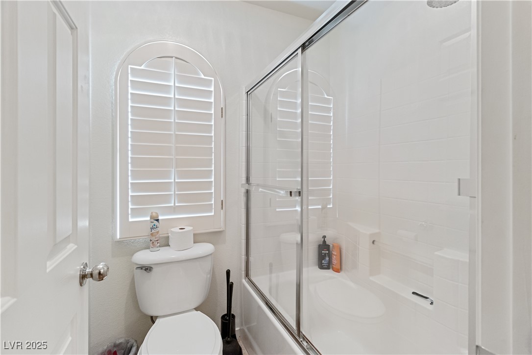 2078 Willow Bay Road Laughlin, NV 89029 - Photo 49 of 99 Full bath featuring bath / shower combo with glass door and toilet