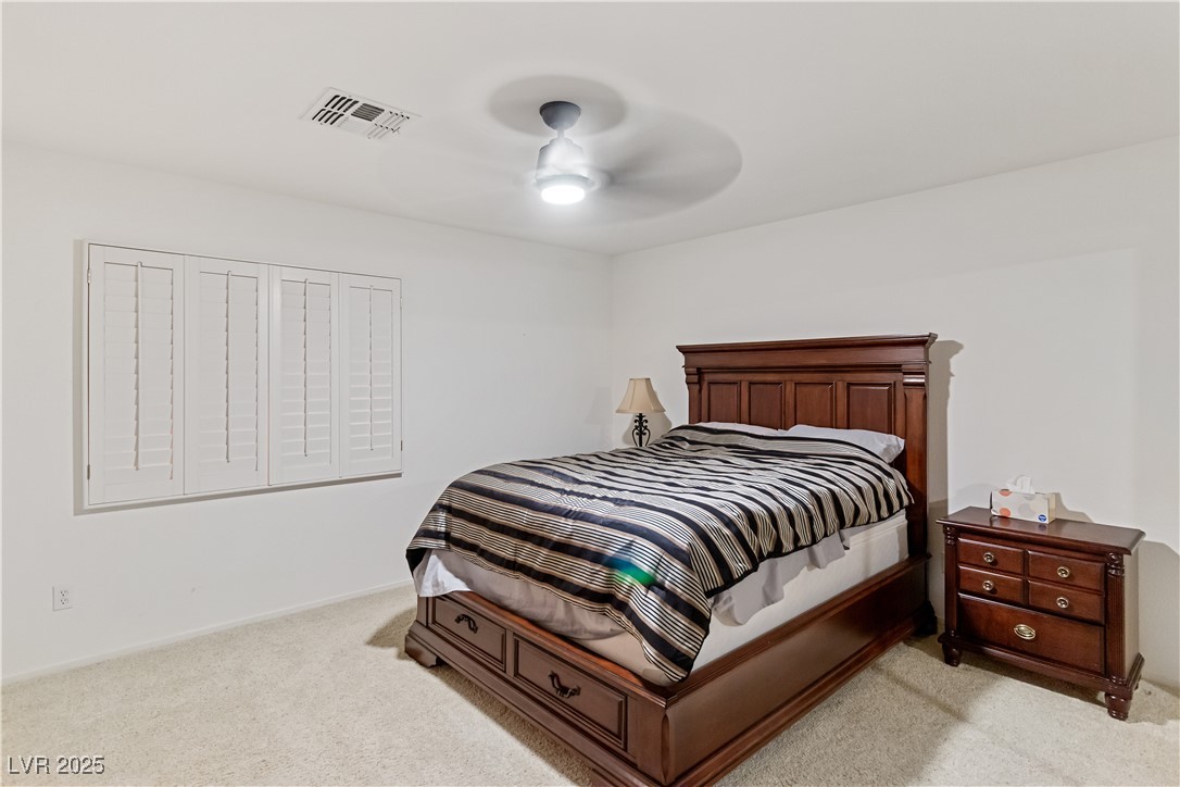 2078 Willow Bay Road Laughlin, NV 89029 - Photo 51 of 99 Third Bedroom with light colored carpet and ceiling fan