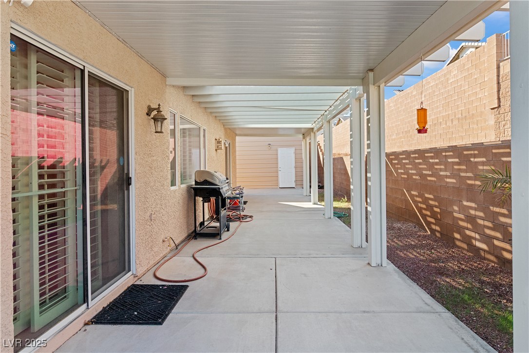2078 Willow Bay Road Laughlin, NV 89029 - Photo 73 of 99 Fenced backyard featuring area for grilling and a patio