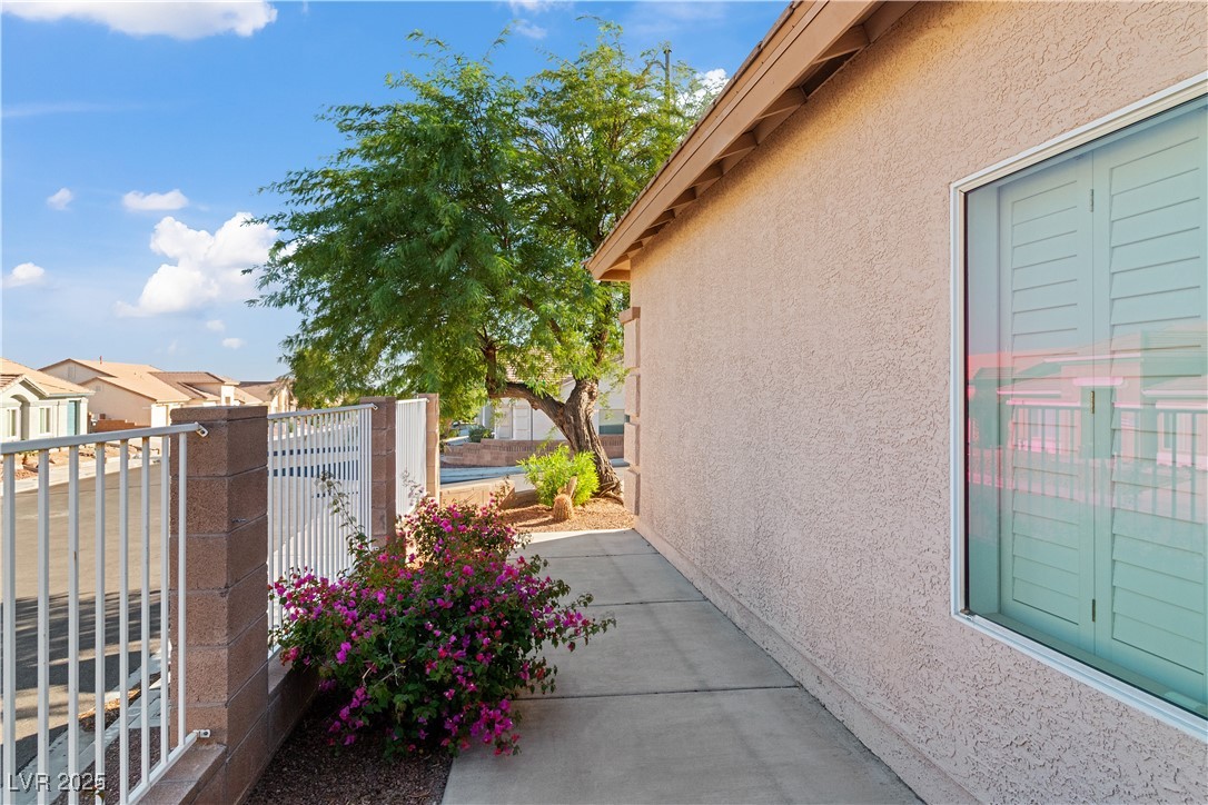 2078 Willow Bay Road Laughlin, NV 89029 - Photo 77 of 99 View of side of home with stucco siding and a residential view