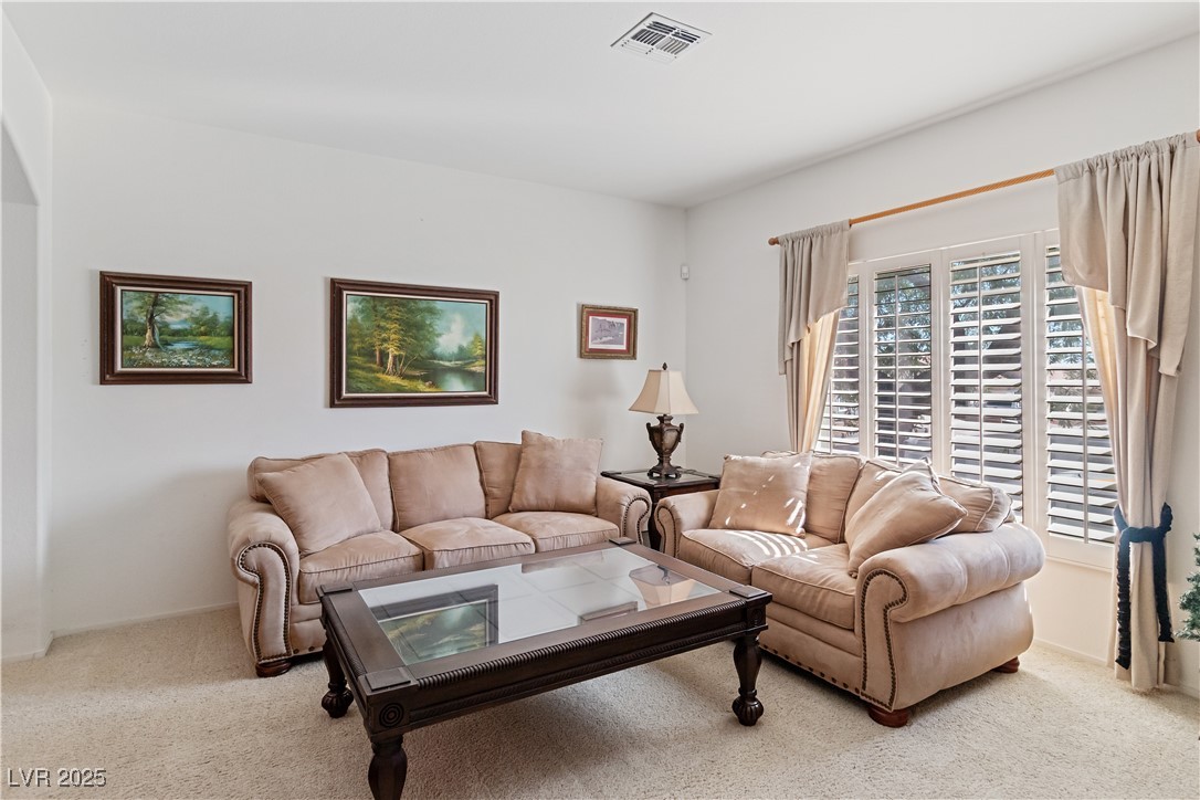 2078 Willow Bay Road Laughlin, NV 89029 - Photo 8 of 99 Living room with carpet and baseboards