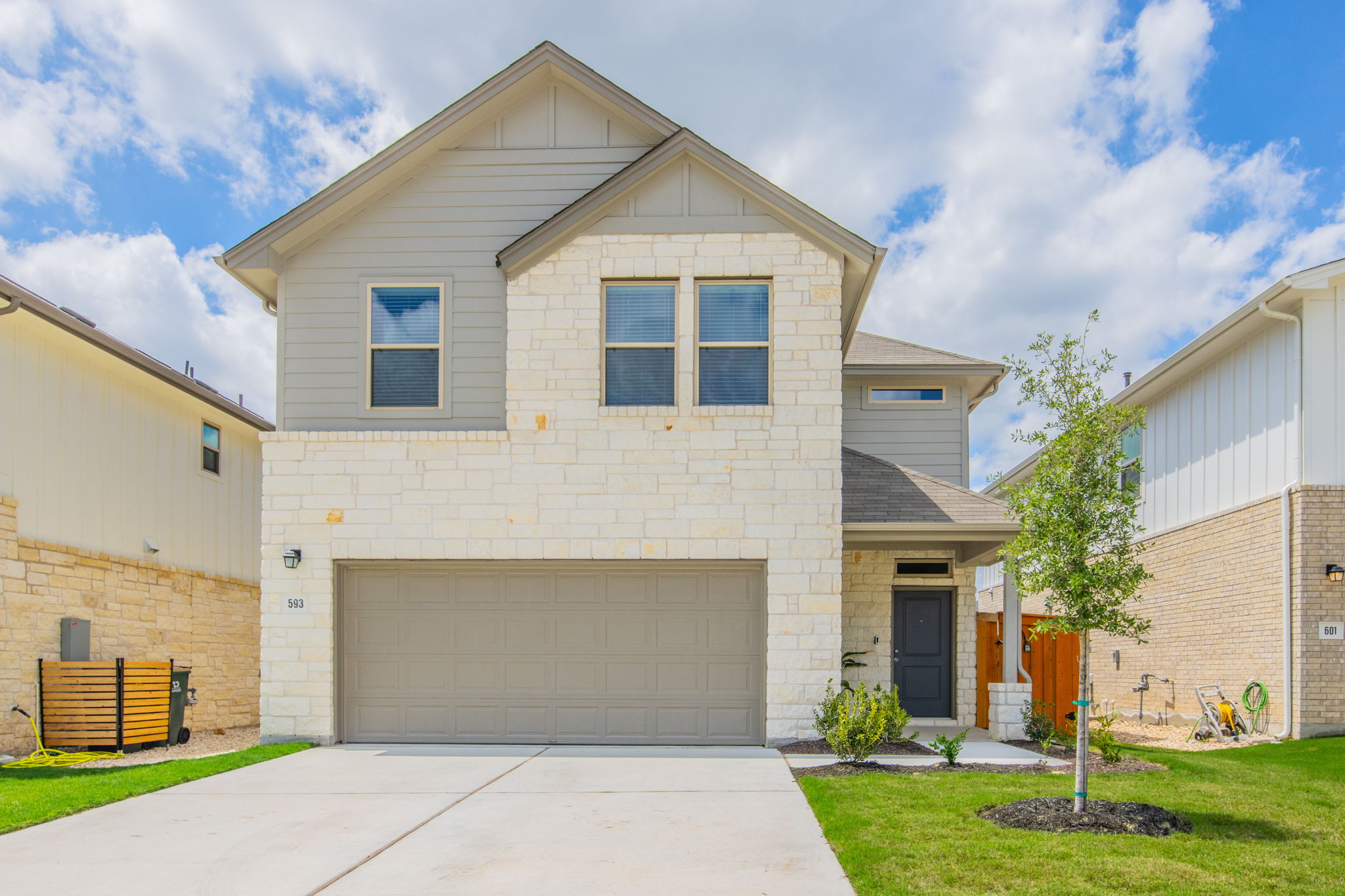 593 Backstays Loop Kyle, TX 78640 - Photo 1 of 26 a front view of a house with a yard and garage