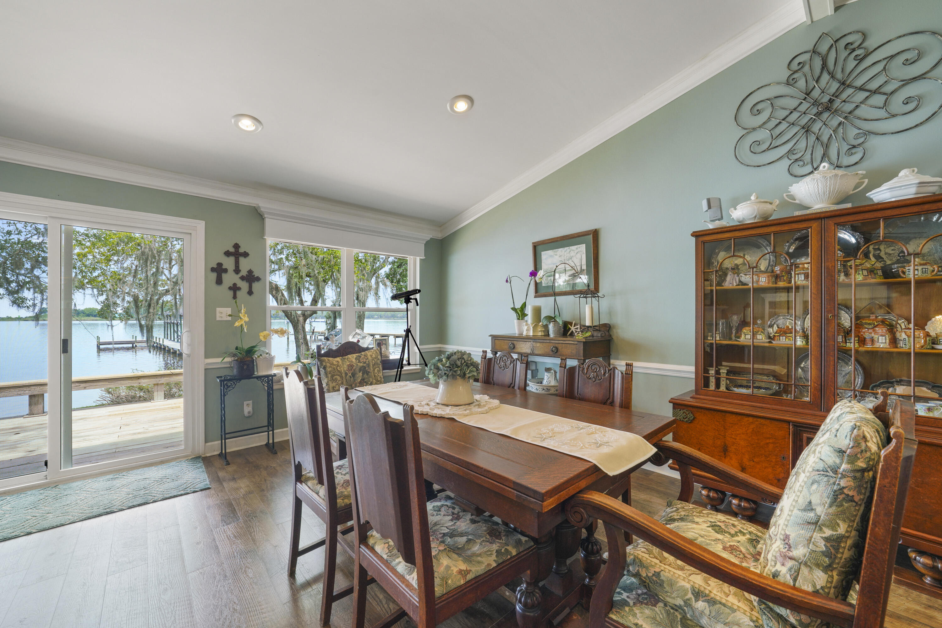 94 George Ellis Point Road Freeport, FL 32439 - Photo 21 of 63 a living room with furniture and large windows