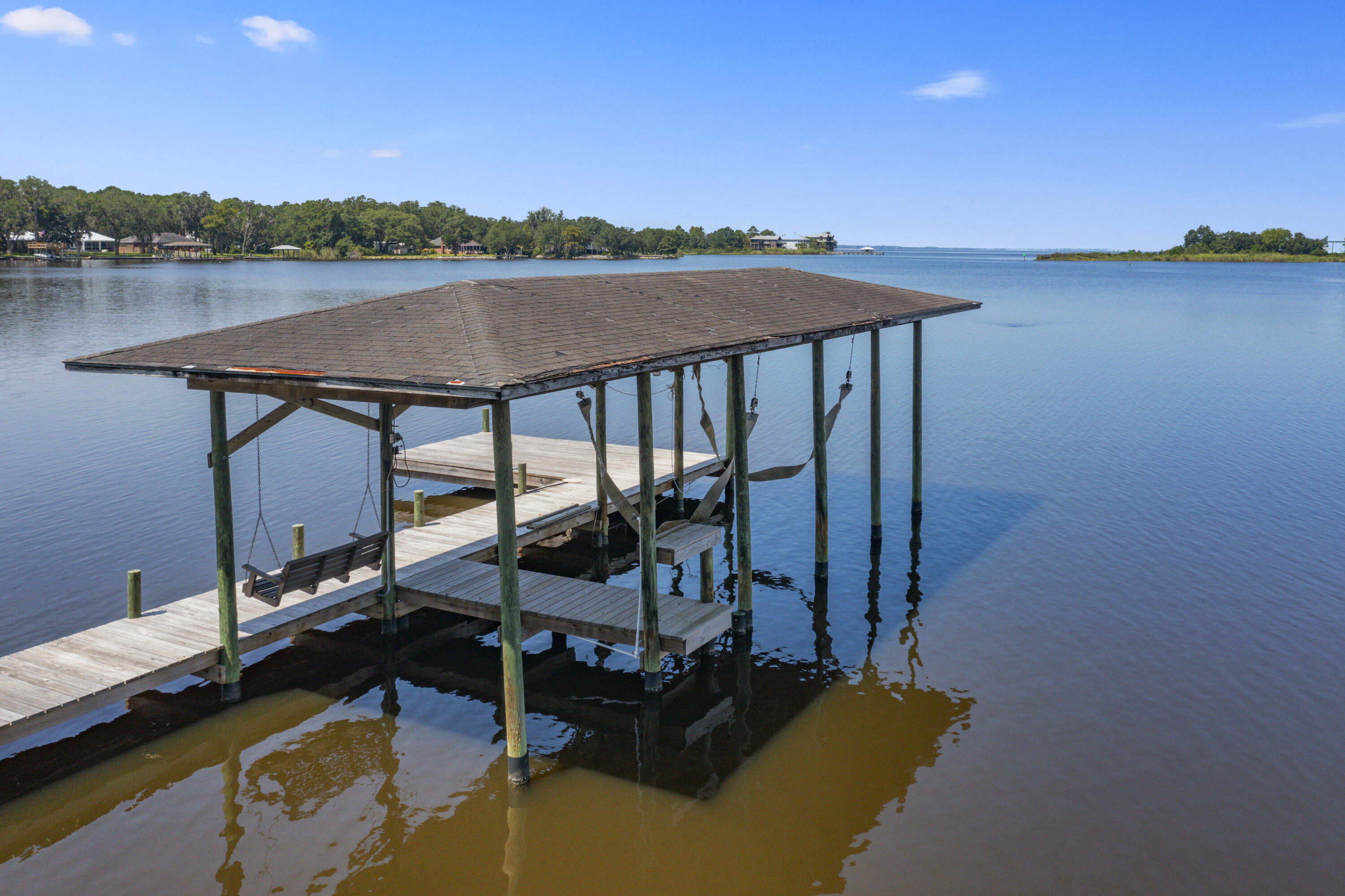 94 George Ellis Point Road Freeport, FL 32439 - Photo 36 of 63 a view of a lake from a balcony