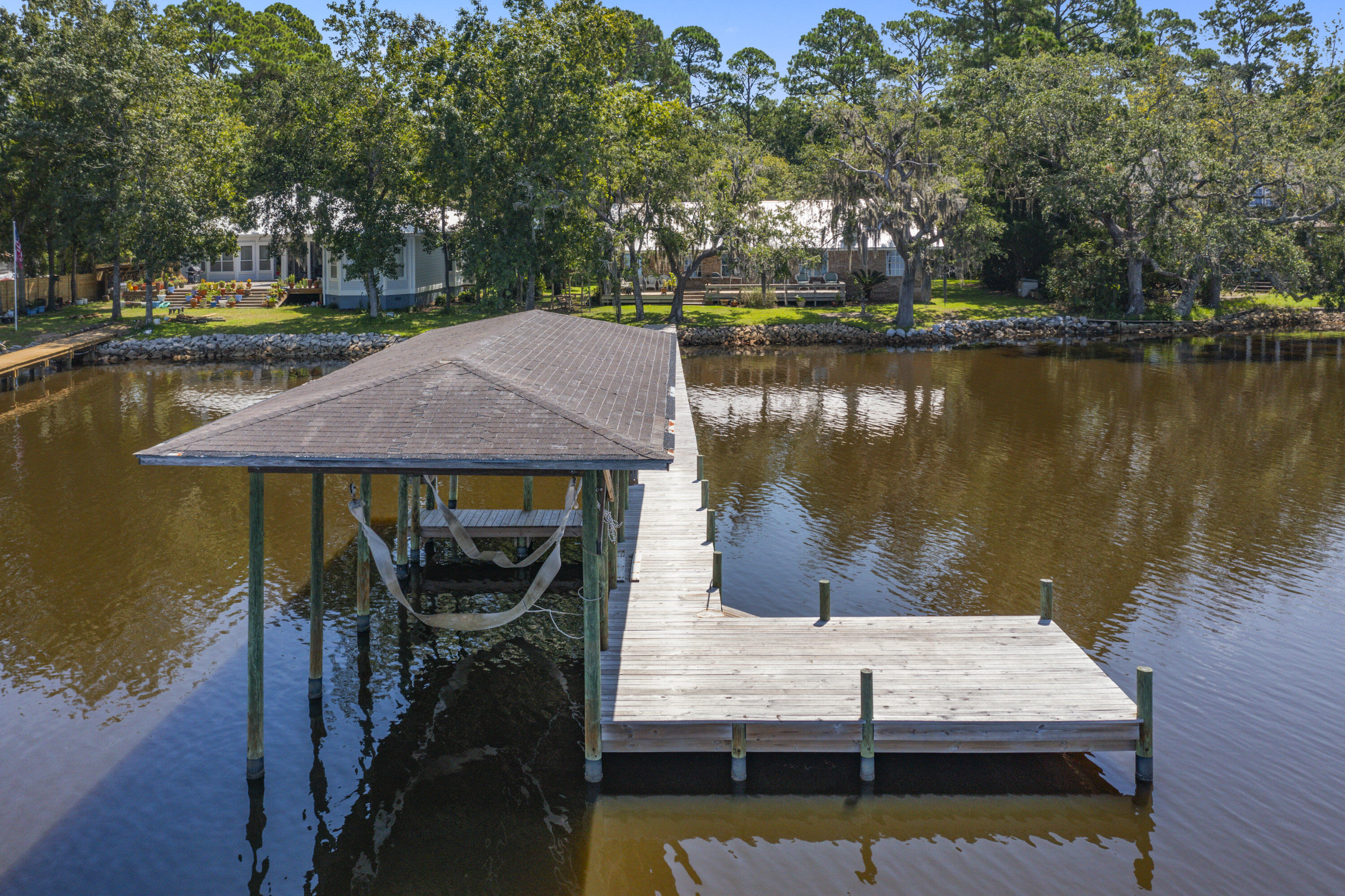 94 George Ellis Point Road Freeport, FL 32439 - Photo 4 of 63 a view of a lake from a house