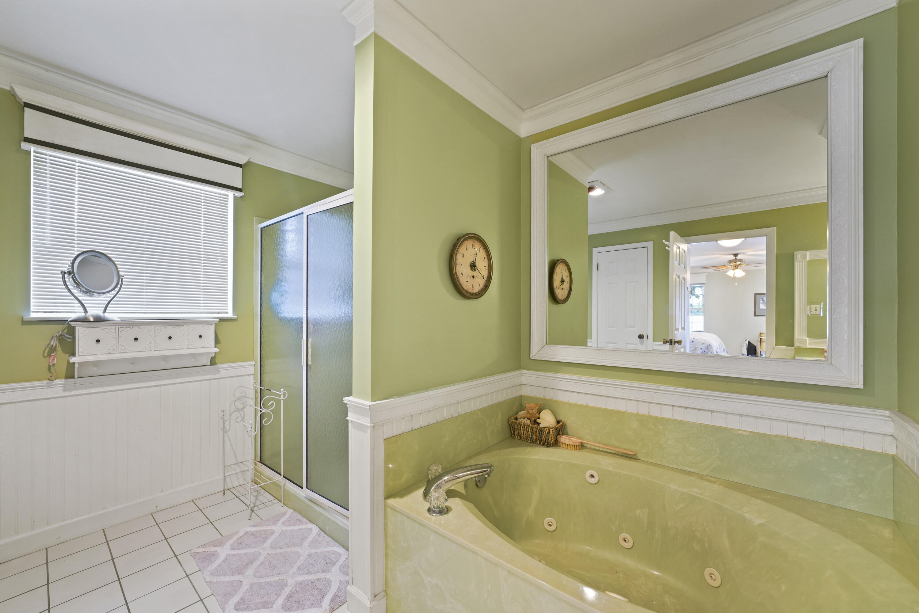 94 George Ellis Point Road Freeport, FL 32439 - Photo 41 of 63 a bathroom with a bathtub and a sink