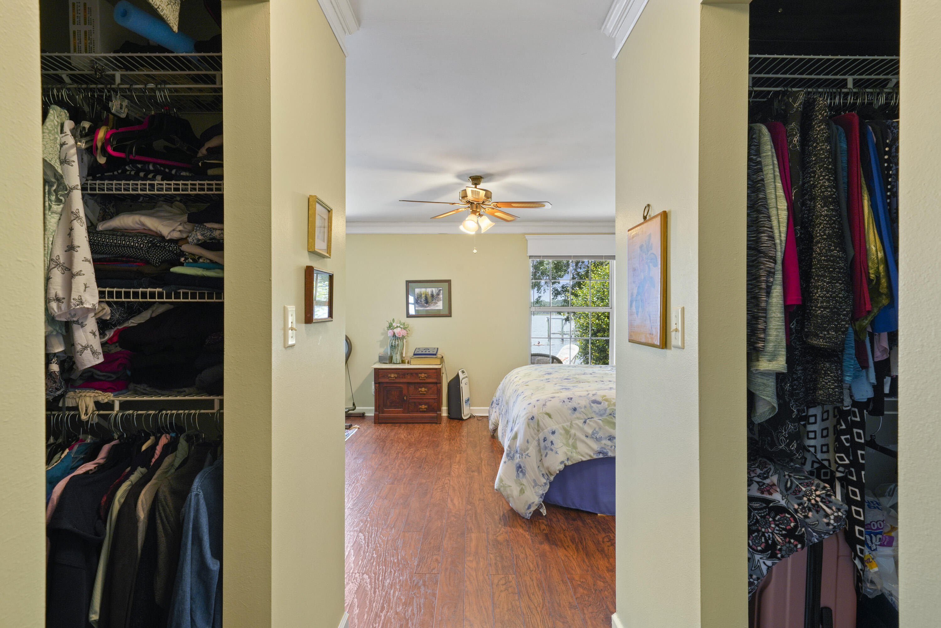 94 George Ellis Point Road Freeport, FL 32439 - Photo 43 of 63 a view of walk in closet with clothes and shoes