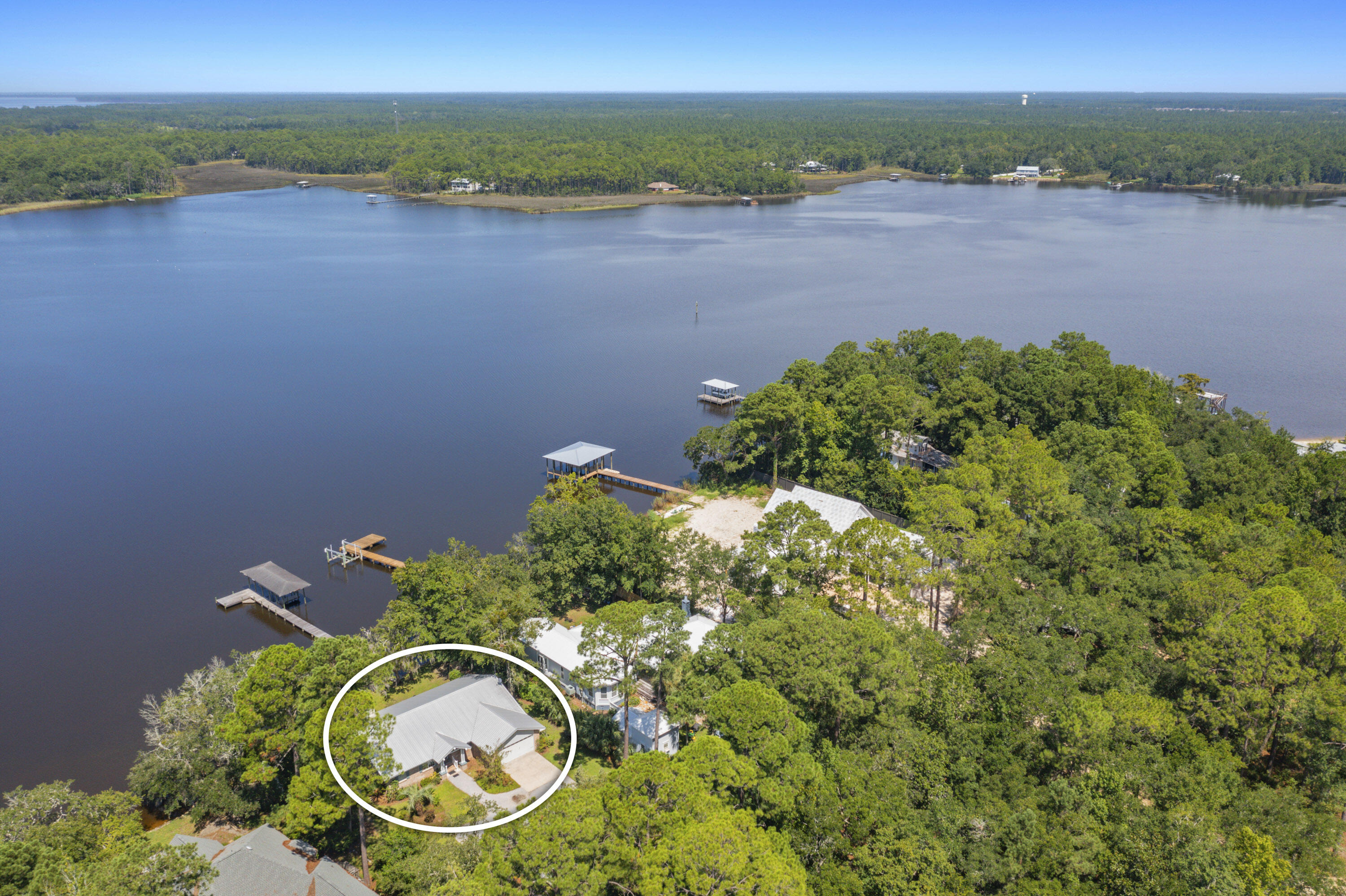 94 George Ellis Point Road Freeport, FL 32439 - Photo 53 of 63 an aerial view of a house with a lake view