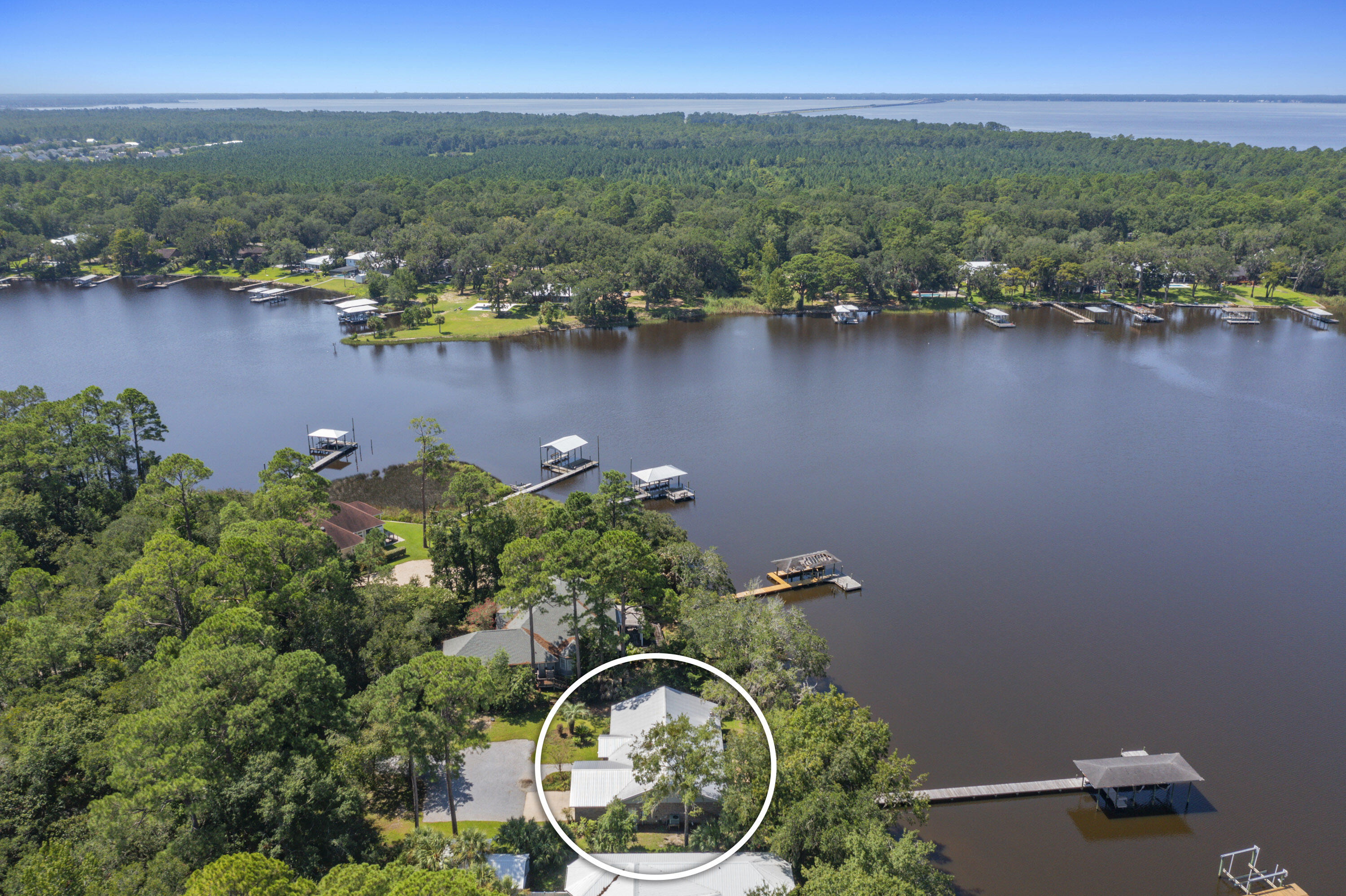 94 George Ellis Point Road Freeport, FL 32439 - Photo 54 of 63 an aerial view of a house with a lake view