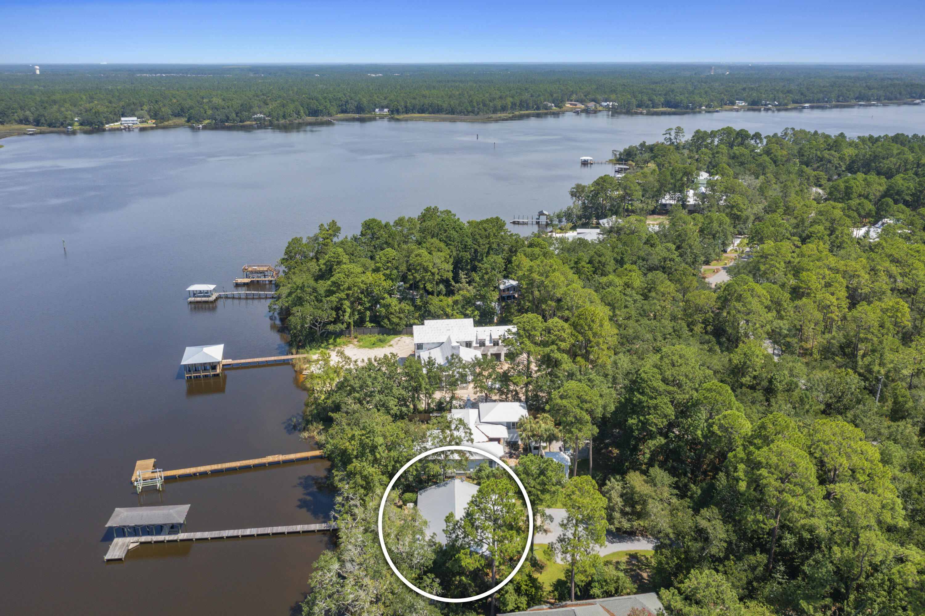 94 George Ellis Point Road Freeport, FL 32439 - Photo 61 of 63 an aerial view of a house with a lake view