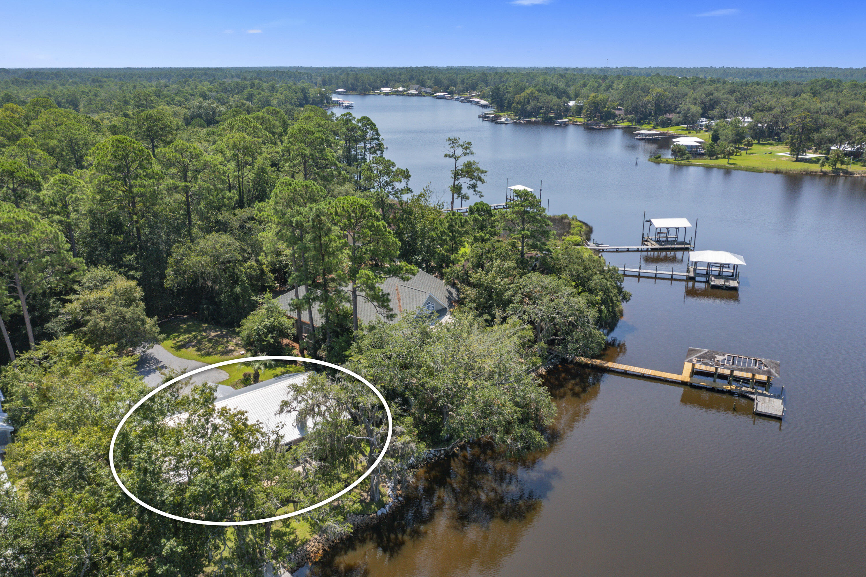 94 George Ellis Point Road Freeport, FL 32439 - Photo 63 of 63 an aerial view of a house with a lake view