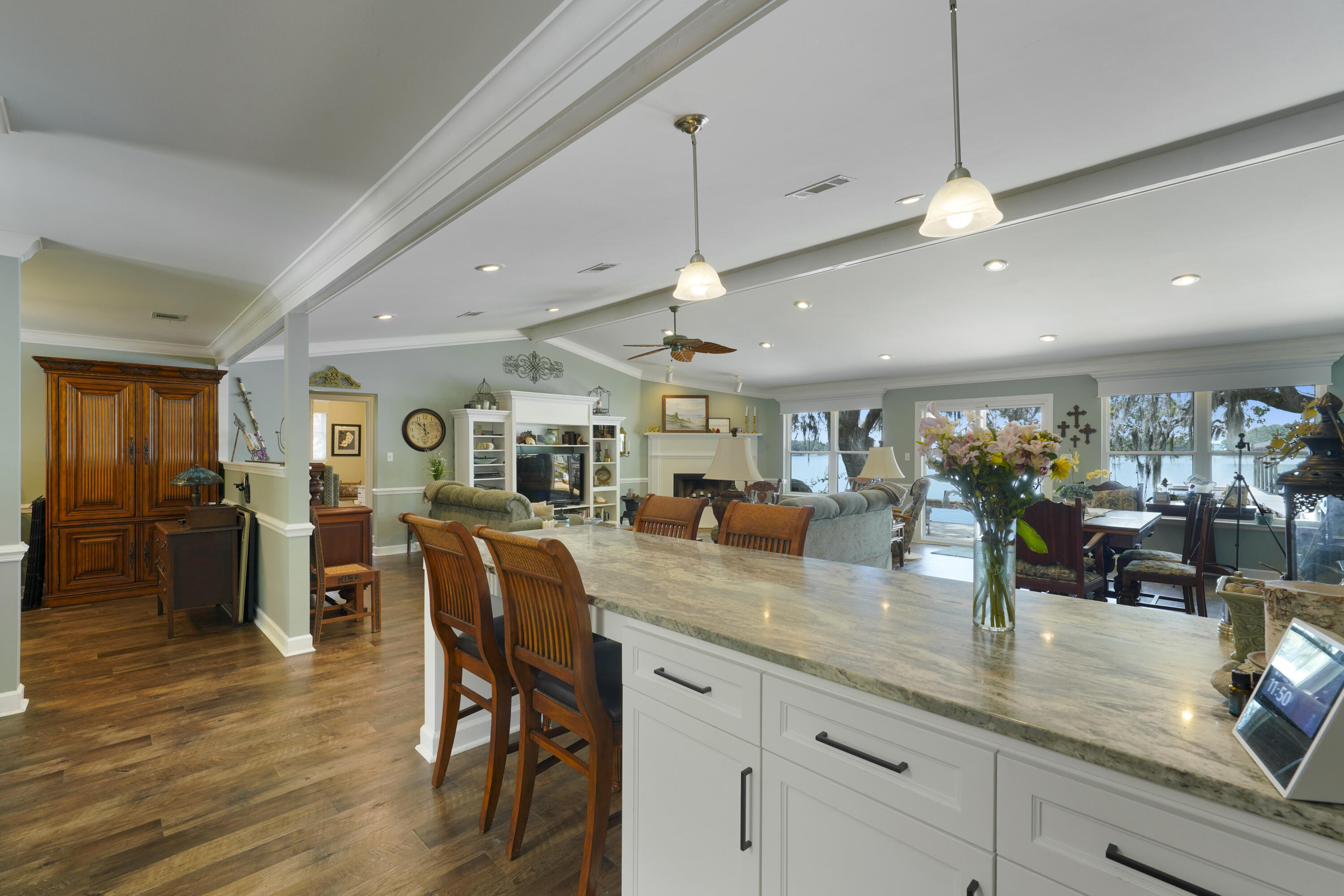 94 George Ellis Point Road Freeport, FL 32439 - Photo 9 of 63 a kitchen with lots of counter space dining table and chairs