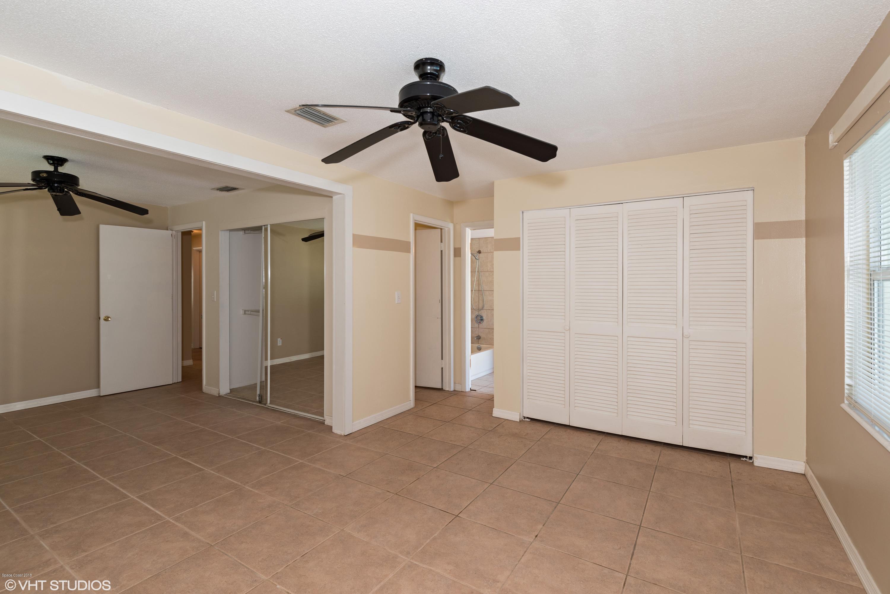 2040 Schooner Road Merritt Island, FL 32952 - Photo 11 of 24 Master Bedroom