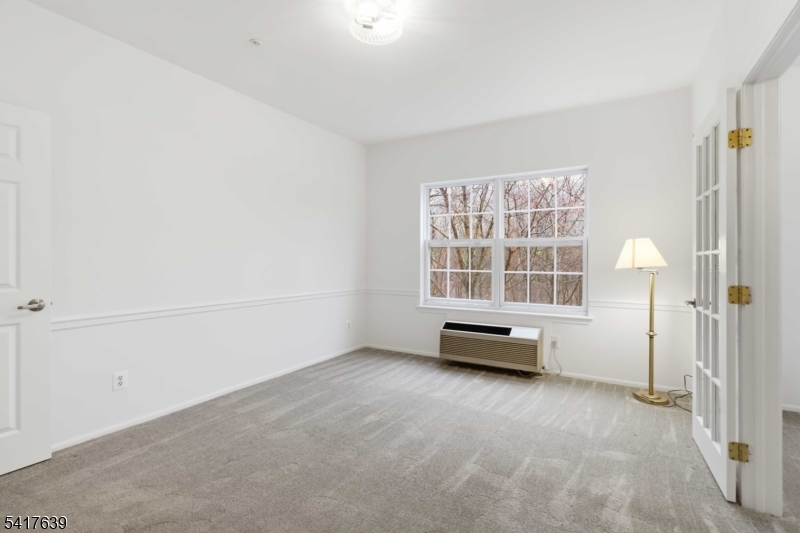 5301 Richmond Road, Unit 301 West Milford, NJ 07480 - Photo 11 of 33 an empty room with a window