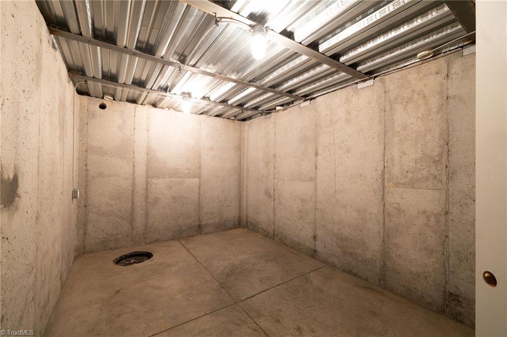 8204 Brotherstwo Road Colfax, NC 27235 - Photo 11 of 50 Full concrete tornado shelter, bunker or storage room.