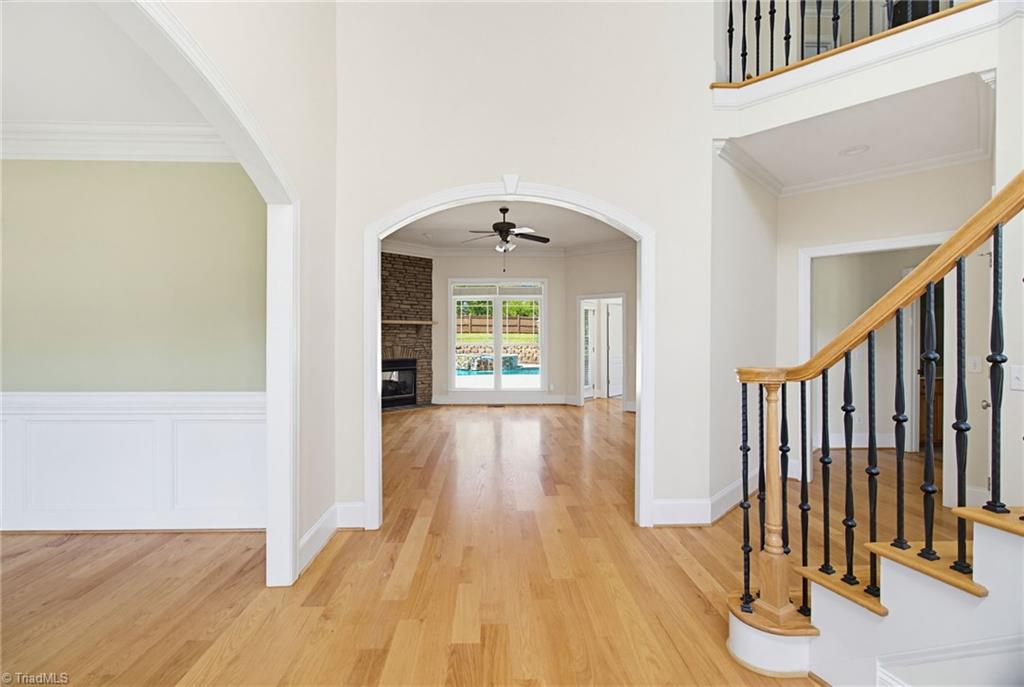 8204 Brotherstwo Road Colfax, NC 27235 - Photo 18 of 50 Grand entrance with wrought iron balustrades
