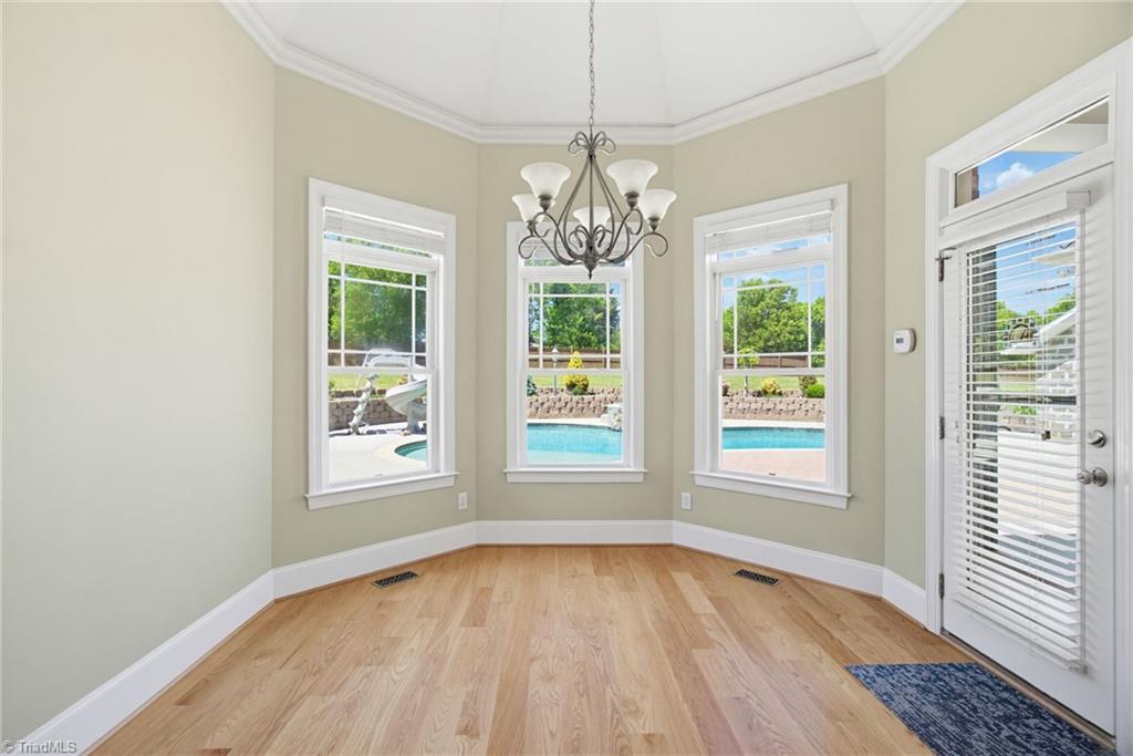 8204 Brotherstwo Road Colfax, NC 27235 - Photo 25 of 50 Breakfast nook with view of pool
