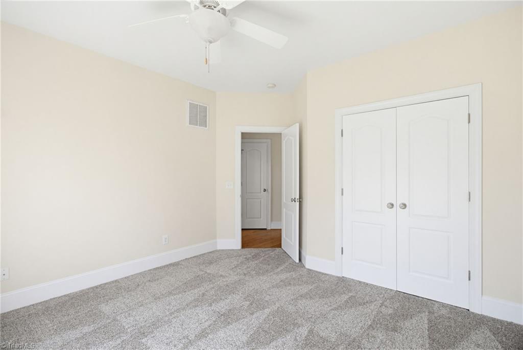 8204 Brotherstwo Road Colfax, NC 27235 - Photo 35 of 50 Secondary main level bedroom