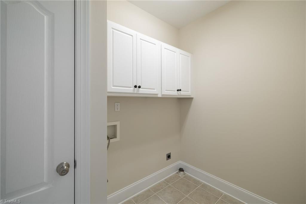 8204 Brotherstwo Road Colfax, NC 27235 - Photo 43 of 50 Laundry room with cabinets