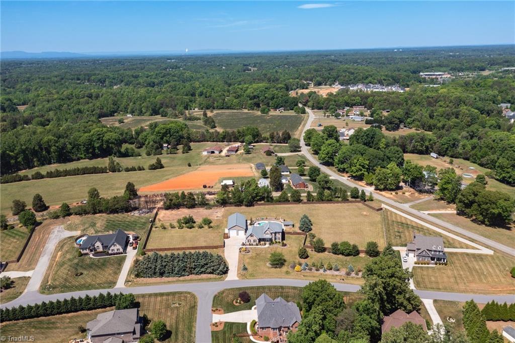 8204 Brotherstwo Road Colfax, NC 27235 - Photo 47 of 50 Aerial view of home and two additional lots